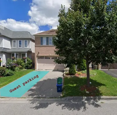 a house with a sign that reads guest builders at Cozy Home away in Ajax 2 BR 1 bath 4 guests in Ajax