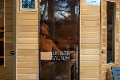 a poster of a man is shown in a window at Luxury Lakefront with Sauna & EV in Washago