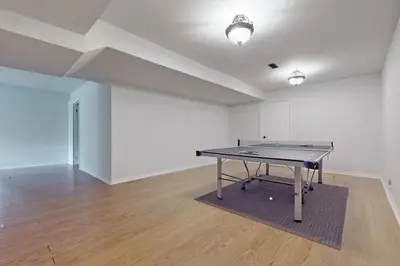 an empty room with a ping pong table in it at Newly renovated luxury villa in Stouffville, ON in Stouffville