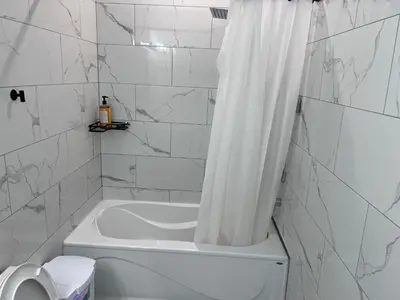 a white bathroom with a tub and a shower curtain at Bb11 Private Bathroom Room In Cambridge in Cambridge