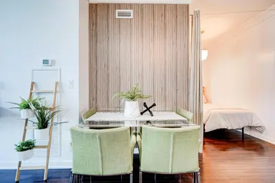 a room with a table and two chairs at The Urban Escape in Toronto