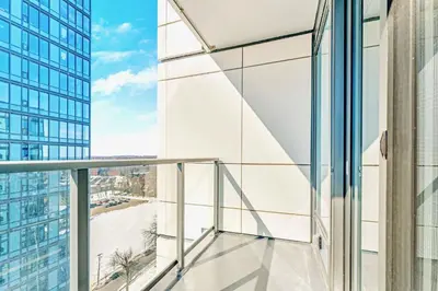 a balcony with a view of a building at High Rise 1BR Building w Gorgeous Views in Kitchener