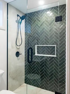 a bathroom with a shower with a glass door at The White House in Caledonia