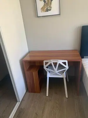 a desk in a room with a chair next to it at Sandy&Kevin#home in Waterloo