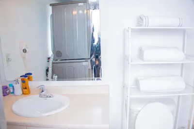 a bathroom with a sink and a mirror at Cozy relaxation haven 1 Bedroom basement in London