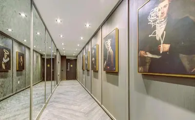 a hallway with paintings on the walls of a museum at Stunning new condo in Oakville in Oakville