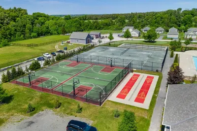 an overhead view of a tennis court with a tennis at 93 Butternut in Cherry Valley
