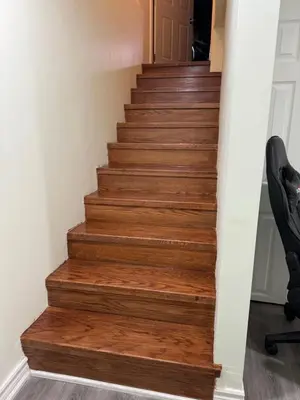 a staircase with wood treads in a house at B01 cozy private room with bathroom in Mississauga