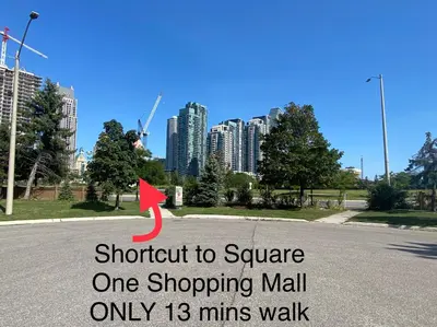 a one shopping mall only mins walk on a road at F3 Spacious room with 2 queen beds and TV in Mississauga