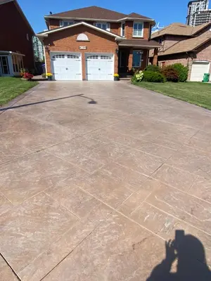 a shadow of a person taking a picture of a driveway at F1 cozy Sunny room in Mississauga