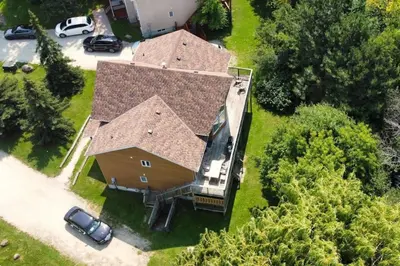 an overhead view of a large house with a roof at The Blue Mountains Chalet for 20- 8BR Bliss w Hot Tub in Blue Mountains