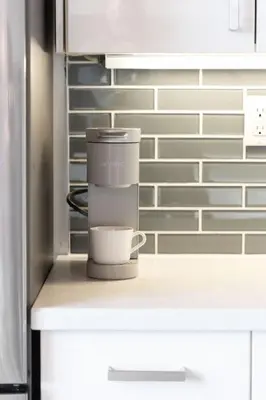 a coffee maker sitting on a counter in a kitchen at Downtown 1BR Modern Condo in Toronto