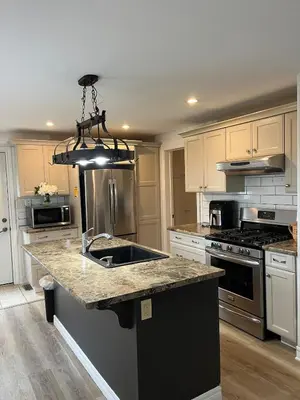 a kitchen with a sink and a stove at Crystal Beach home in Niagara in Fort Erie