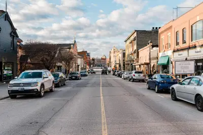 a city street with cars parked on the street at The Wallace Suite - Stratford in Stratford