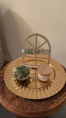 a plate with a bowl of food on a table at Welcome to our cozy private Home in Pickering
