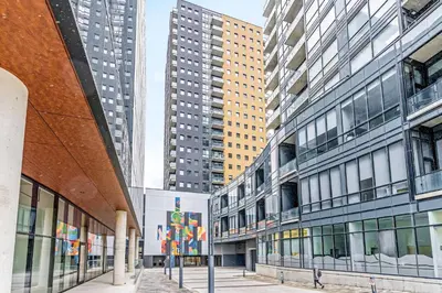 a group of tall buildings in a city at DT High Rise Condo w Private Patio and View in Kitchener