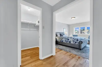 a bedroom with a bed in a room at Spacious 4BR Home with Parking in Richmond Hill