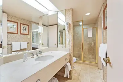 a bathroom with a large sink and a shower at Luxury Resort Stay with Pool Jacuzzi and Balcony in Edgar