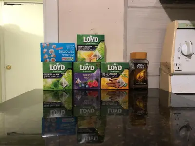 a group of four packages of food sitting on a counter at Earth Tone Suites in Pickering