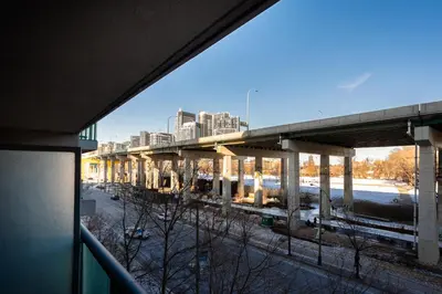 a view of a city skyline from a building at Downtown Cozy 1BR Condo- Steps from Lake & King street in Toronto