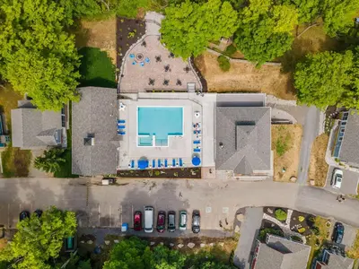 an overhead view of a building with a swimming pool at The Merlin - 61 Butternut in Cherry Valley