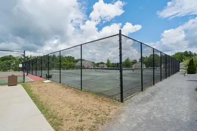 a tennis net on a tennis court at The Merlin - 61 Butternut in Cherry Valley