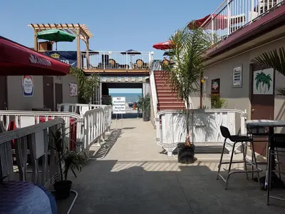 a stairway leading to a building with a deck at Lakeview Resort Motel in Wasaga Beach