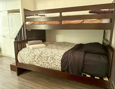 a bedroom with two bunk beds in a room at KingBed & Bunkbed & Terrace in Toronto