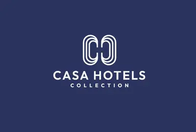 a logo for a casa hotels collection at Casa Hotel Elegant Suite w Patio BBQ Grill in Toronto