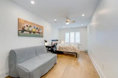 a bedroom with a bed and a desk at Toronto Midtown Home Suites in Toronto