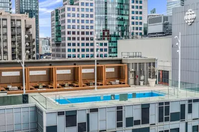 a pool on the roof of a building with buildings at Boho 2bdrm Sleeps 6 near Rogers MTCC Union CN tower in Toronto