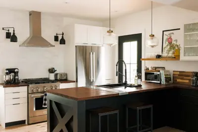 a kitchen with a sink and a stove top oven at SquirrelHaus PEC in Hillier