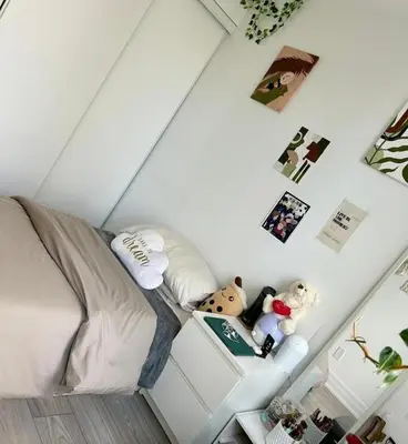 a room with a bed with stuffed animals on it at Modern & Stylish Condo Downtown in Mississauga