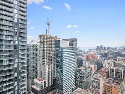 an aerial view of a city with tall buildings at The Aventi Suites - Downtown Toronto - Across TIFF Bell Lightbox in Toronto