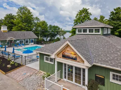 an aerial view of a house with a swimming pool at The Cardinal - 7 Hollow in Cherry Valley