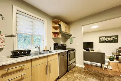 a kitchen with a sink and a stove and a window at Canada WonderLand Stay-Superb Location in Vaughan