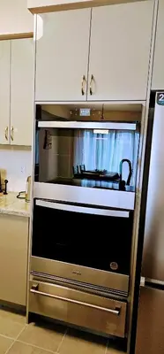 a kitchen with a large oven in a kitchen at Luxury 5 Bed Retreat for 12 with Gourmet Kitchen in Paris