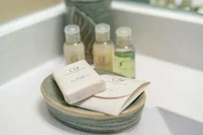 a tray with bottles of essential oils on a counter at John & Gate House boutique Bed and Breakfast in Niagara on the Lake