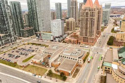 an aerial view of a city with tall buildings at Sky Retreat | 2BR-2BA High Floor | 180° City View in Mississauga