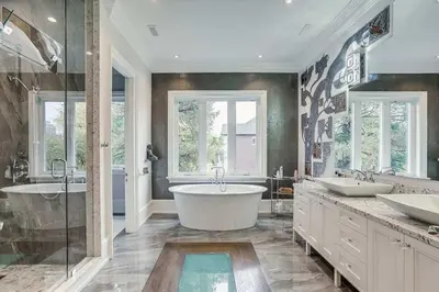 a large bathroom with two sinks and a tub at Elegant Home with Yard and Comforts in Richmond Hill