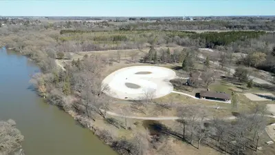 an aerial view of a large swimming pool next to a river at Beautiful Separate Unit, GrandRiver & Kiwanis Park in Kitchener