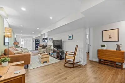 a living room with a couch and a table at Family-Friendly 2BR Near Lake & Downtown in Cobourg
