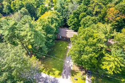 an aerial view of a river with a train in the middle at Innisfil retreat, hot tub, Sauna, EV plug, Generac in Innisfil