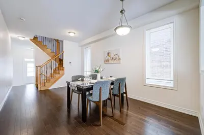 a dining room with a table and chairs at Richland Modern Luxury house in Richmond Hill