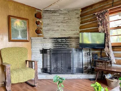 a living room with a fireplace and a flat screen tv at Balsam Lake - 2-Bedroom House in Kawartha #15 in Kawartha Lakes