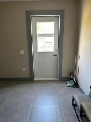an empty room with a door and a window at 3-bedroom Villa in Lakefield #15 in Lakefield