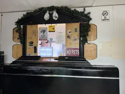 a stage with a no pets sign on it at Idlewood Inn in Toronto