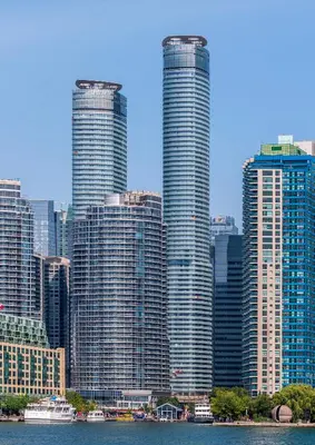 a group of tall buildings in a large city at Luxury Lakeview Downtown Condo, CN Tower, Rogers Center, Scotia Arena, Lake View with Free Parking in Toronto