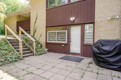 a front door of a house with a tarp on it at 2 Bed 2 Bath Bunglow in Mississauga Yyz PortCredit in Mississauga