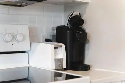 a coffee maker sitting on top of a counter at Waterfront Bliss Firepit and BBQ in Hanover